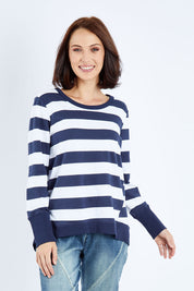 Model Andrea wearing size 10 of the Dolly Sweat in colour Navywhite (Blue), from the front, cropped image