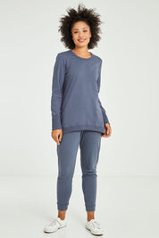 Model Olivia wearing size 10 of the Dolly Sweat in colour Indiblue (Blue), from the front, showing the whole outfit