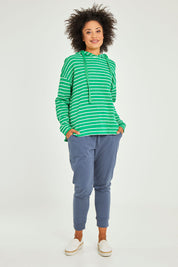 Model Olivia wearing size 10 of the Marissa Jogger in colour Indiblue (Blue), from the front, showing the whole outfit