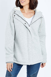 Model Andrea wearing size 10 of the Cher Jacket in colour Grey (Grey), from the front, cropped image