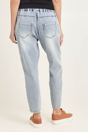 Model Madeline wearing size 10 of the Brooks Jean in colour Lightblue (Blue), from the back
