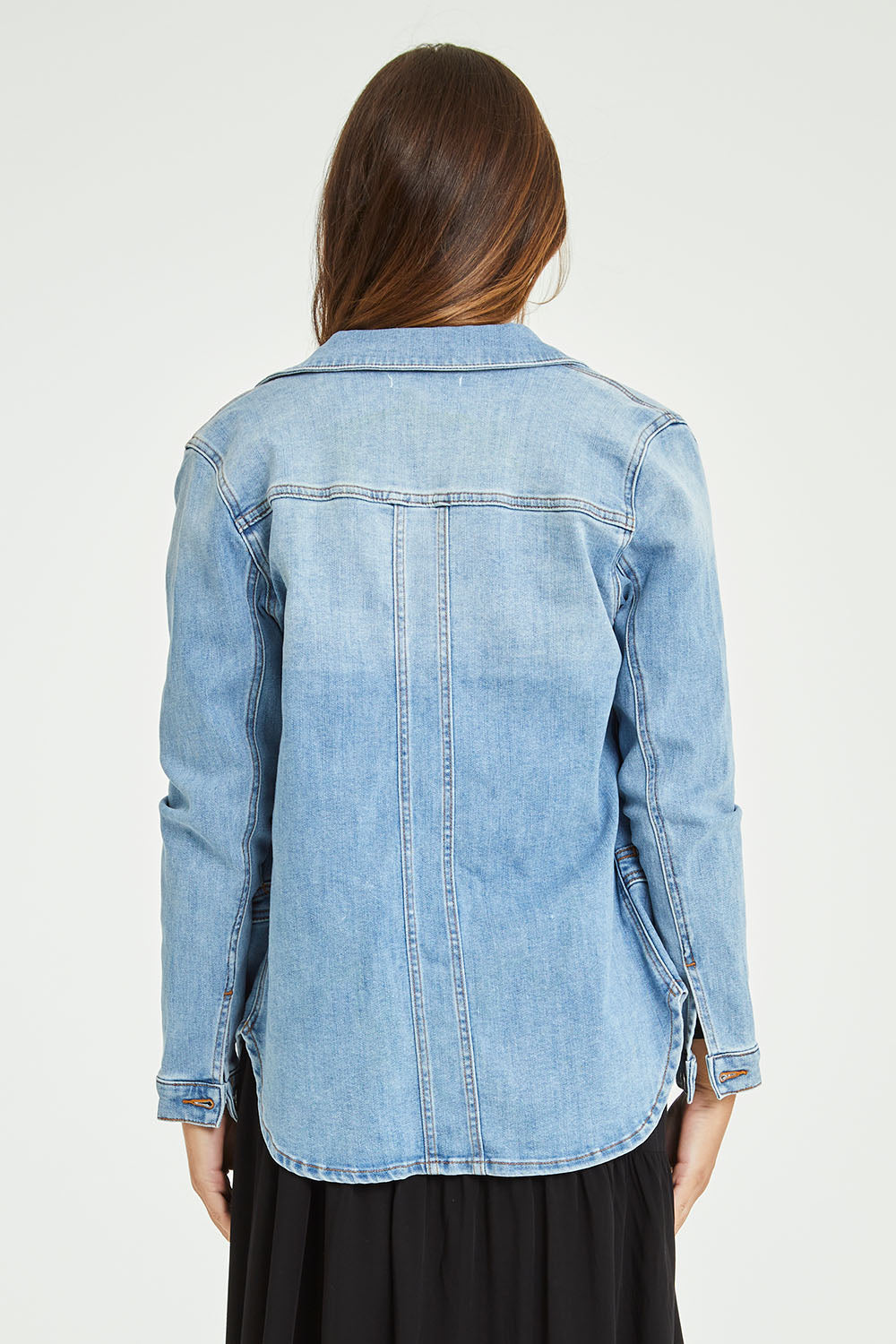 Model Tahlia wearing size 10 of the Reese Denim Shacket in colour Denim (Blue), from the back