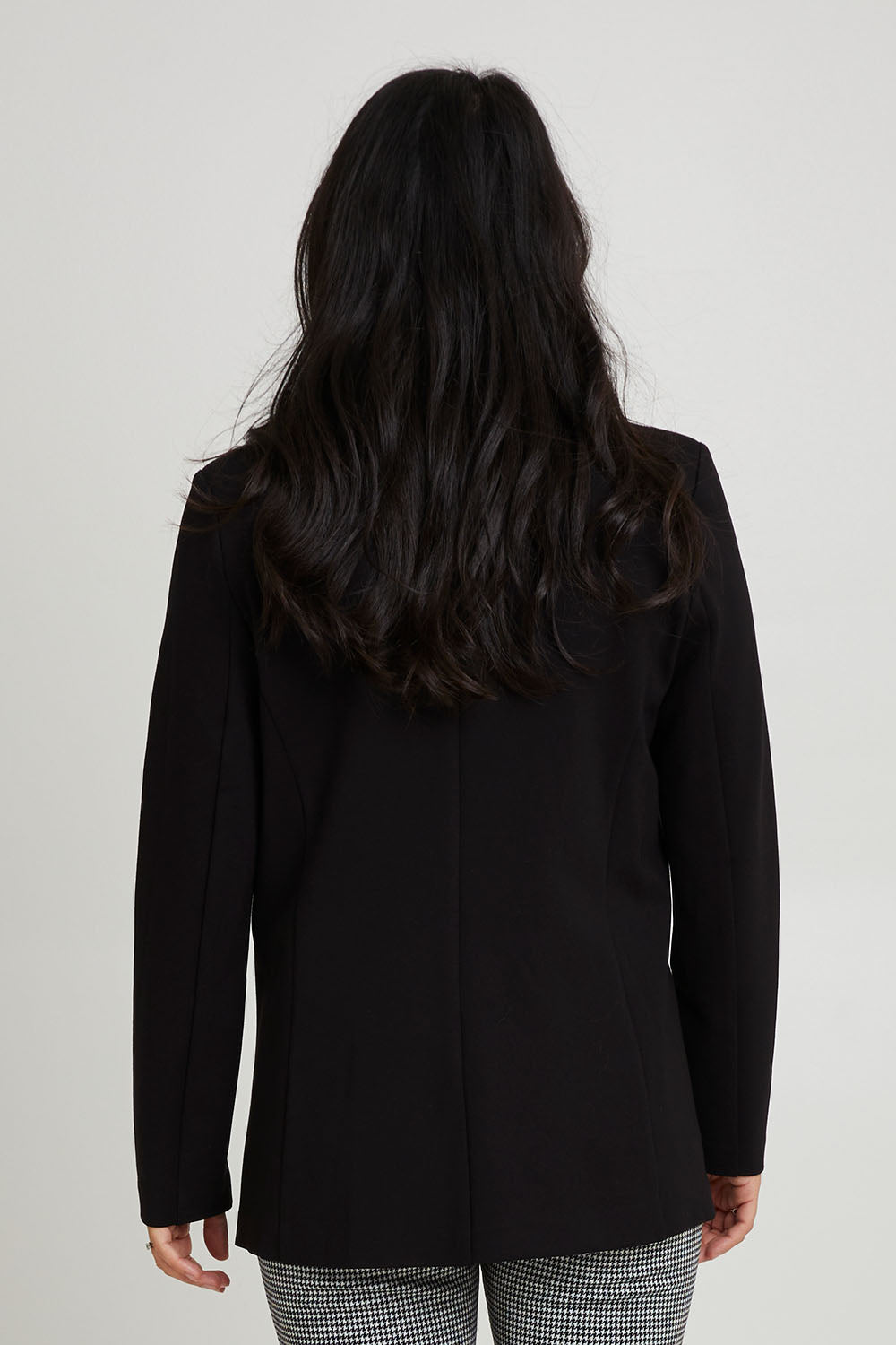 Model Katie wearing size 10 of the Portsea Blazer in colour Black (Black), from the back