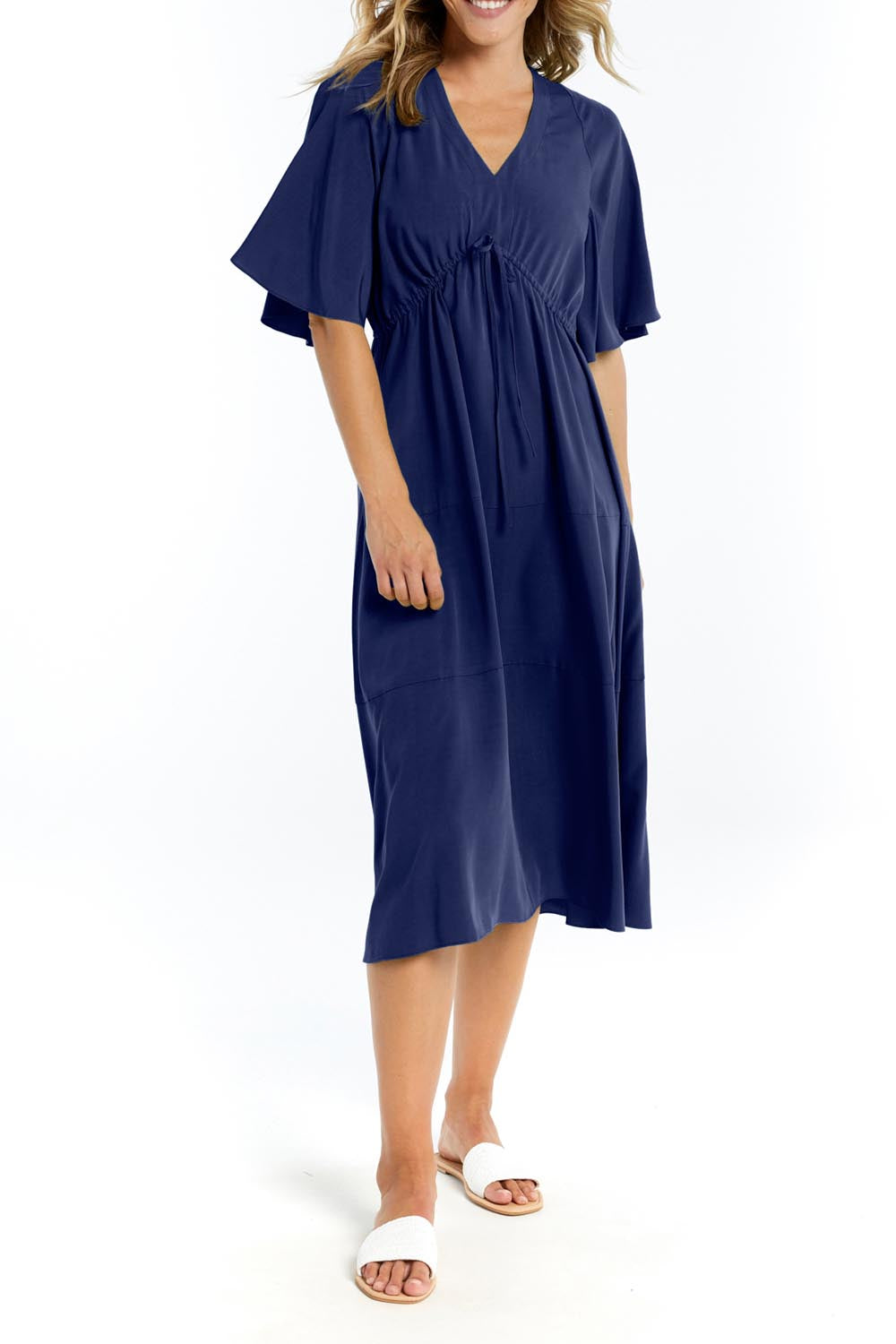 A model wearing the Cora Cotton Dress in colour Frenchblue (Blue), from the front, cropped image
