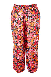 Product shot of the Sarah Pant in colour Brushflora (Pink), from the back