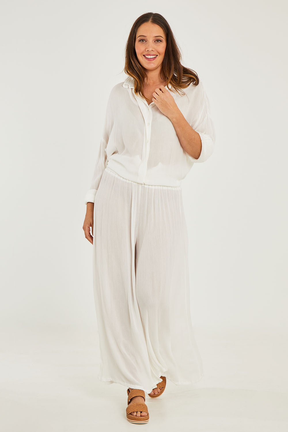 Model Georgia wearing size 10 of the Renae Wide Leg Pants in colour White (White), from the front, showing the whole outfit