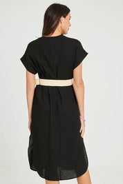 Model Madeline wearing size S of the Roma Linen Dress in colour Black (Black), from the back