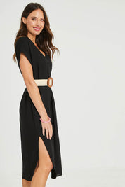 Model Madeline wearing size S of the Roma Linen Dress in colour Black (Black), from the front, cropped image