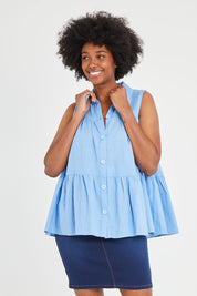 Model Aiyana wearing size 10 of the Prague Paneled Blouse in colour Cornflower (Blue), from the front, cropped image