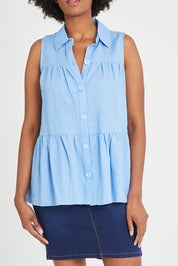 Model Aiyana wearing size 10 of the Prague Paneled Blouse in colour Cornflower (Blue), from the front, cropped image