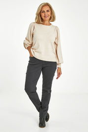 Model Sandy wearing size 10 of the Wynona Curve Jeans in colour Graphite (Black), from the front, showing the whole outfit