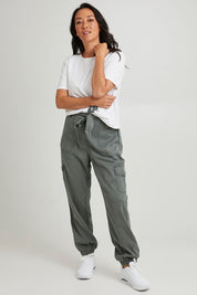 Model Katie wearing size 10 of the Canterbury Lyocell Cargo Pants in colour Khaki (Green), from the front, showing the whole outfit