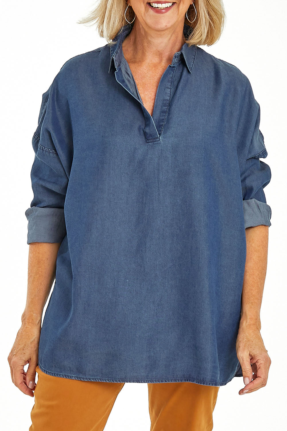 Model Sandy wearing size 10 of the Carmen Pop Over Shirt in colour Darkdenim (Blue), from the front, cropped image