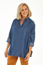 Model Sandy wearing size 10 of the Carmen Pop Over Shirt in colour Darkdenim (Blue), from the front, cropped image