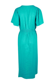 Product shot of the Whitney Dress in colour Teal (Green), from the back