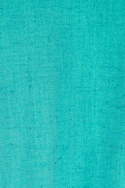 Product shot of the Whitney Dress in colour Teal (Green), detail