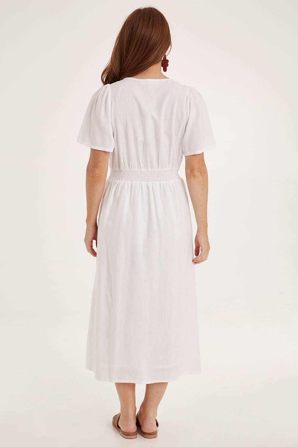 Model Sally wearing size 10 of the Whitney Dress in colour White (White), from the back