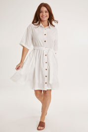 Model Sally wearing size 10 of the Miley Lyocell Shirt Dress in colour White (White), from the front, showing the whole outfit