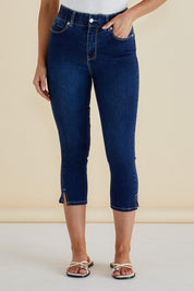 A model wearing the Camila Crop Jeans in colour Midnight (Blue), from the front, cropped image