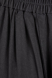Product shot of the Olympia Pant in colour Black (Black), detail