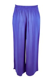 Product shot of the Olympia Pant in colour Decoblue (Blue), from the back