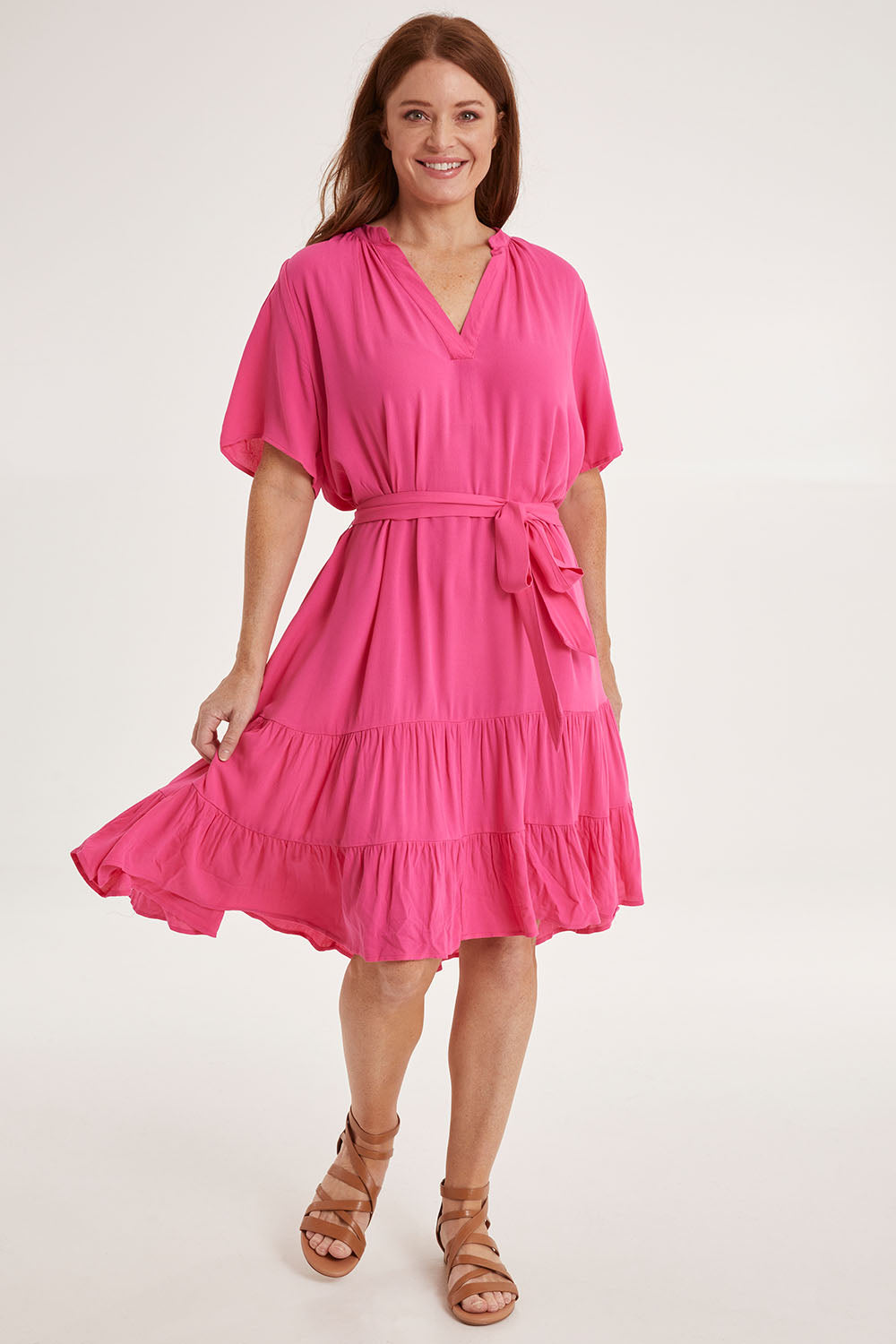 Model Sally wearing size 10 of the Port Douglas Dress in colour Frenchrose (Pink), from the front, showing the whole outfit