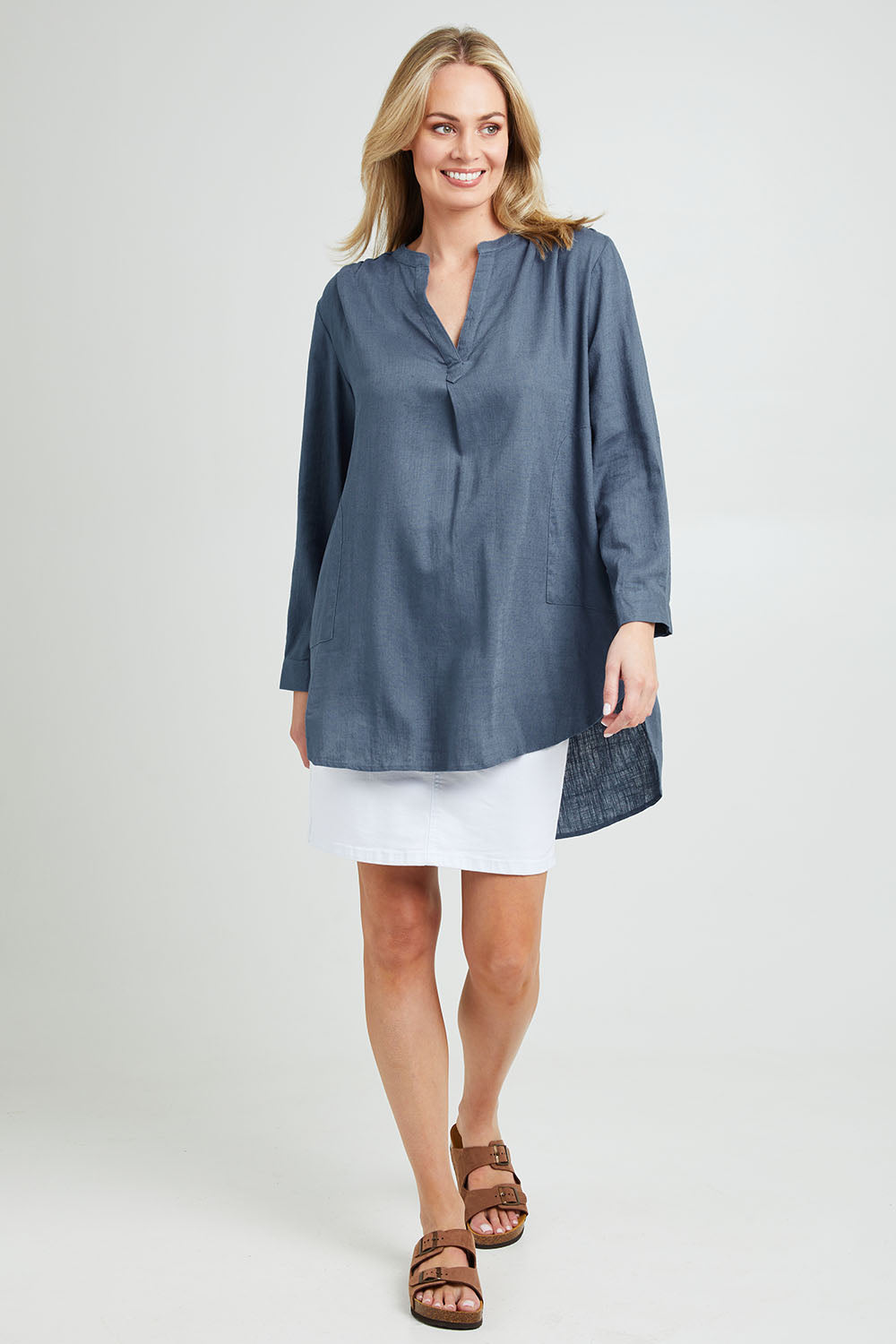 Model Grace wearing size 10 of the Beach Tunic Shirt in colour Blue (Blue), from the front, showing the whole outfit