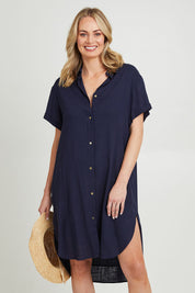 Model Grace wearing size 10 of the Lani Linen Shirt Dress in colour Navy (Blue), from the front, cropped image