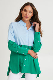 Model Madeline wearing size 10 of the Splice Shirt in colour Greenblue (Green), from the front, cropped image