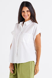A model wearing the Mara Cotton Shirt in colour White (White), from the front, cropped image