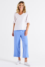 A model wearing the Elanora Linen Blend Blouse in colour White (White), from the front, showing the whole outfit