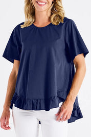 A model wearing the Candice Cotton Blouse in colour Frenchblue (Blue), from the front, cropped image