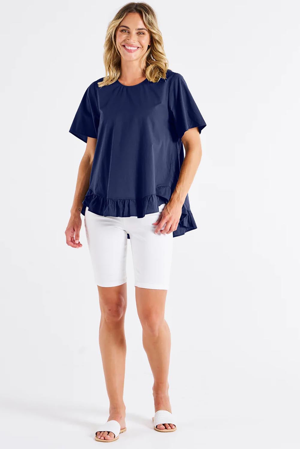 A model wearing the Candice Cotton Blouse in colour Frenchblue (Blue), from the front, showing the whole outfit