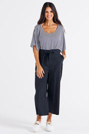 A model wearing the Cabo Cotton Crop Pant in colour Black (Black), from the front, showing the whole outfit