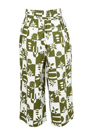 Product shot of the Cabo Cotton Crop Pant in colour Geofloral (Green), from the back