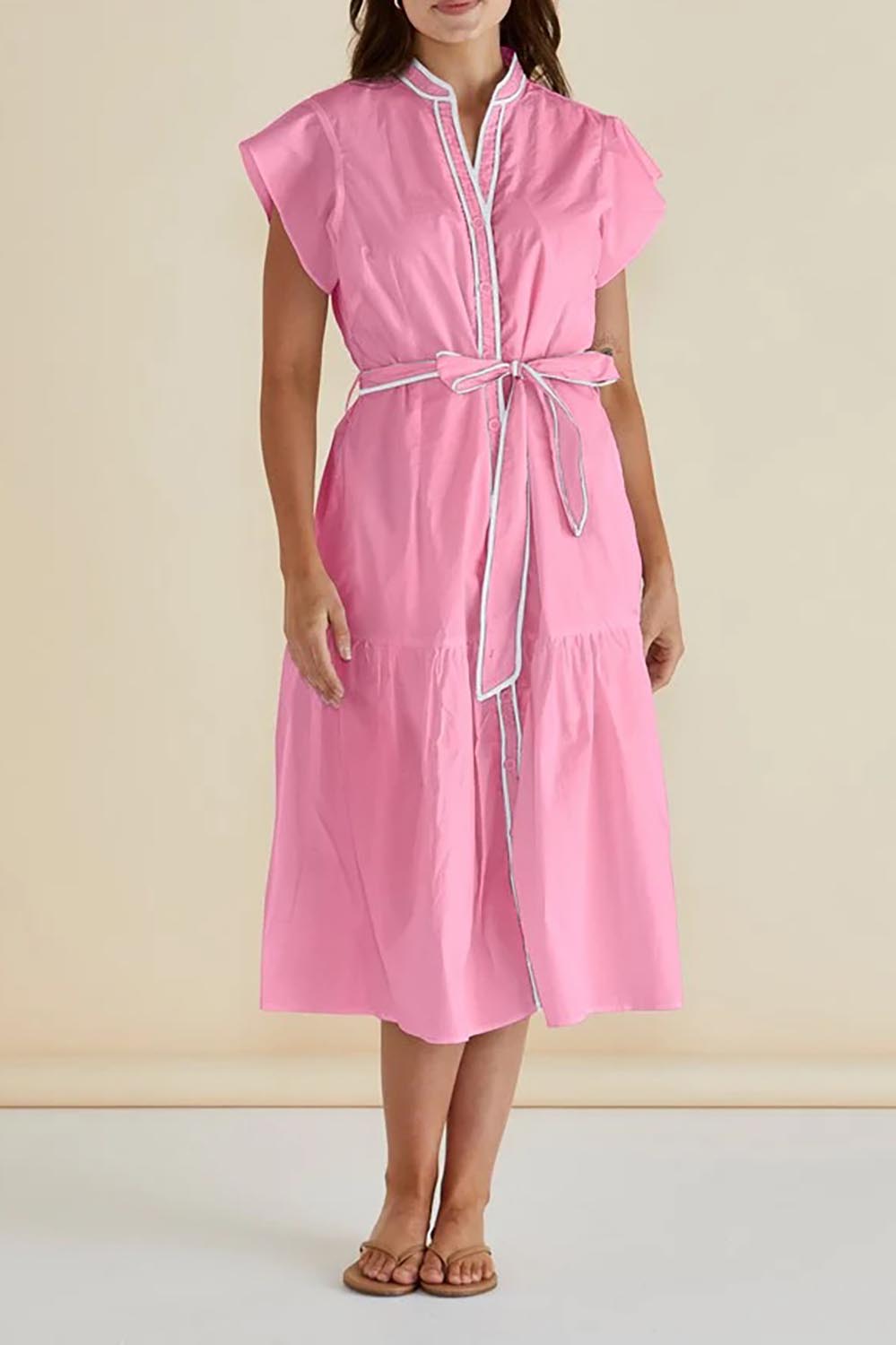 A model wearing the Mari Cotton Dress in colour Blush (Pink), from the front, showing the whole outfit