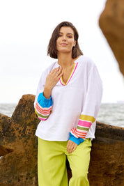 A model wearing the Blossom Linen Blend Blouse in colour White (White), from the front, showing the whole outfit