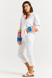 A model wearing the Blossom Linen Blend Blouse in colour White (White), from the front, showing the whole outfit