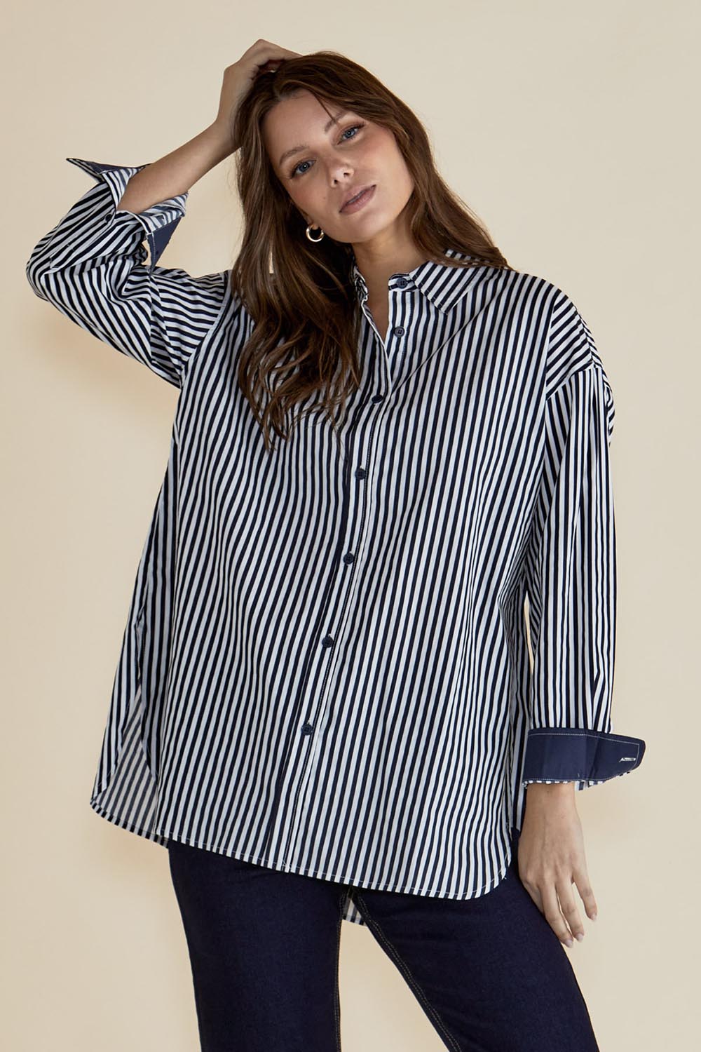 A model wearing the Claire Classic Cotton Shirt in colour Navystripe (Blue), from the front, cropped image