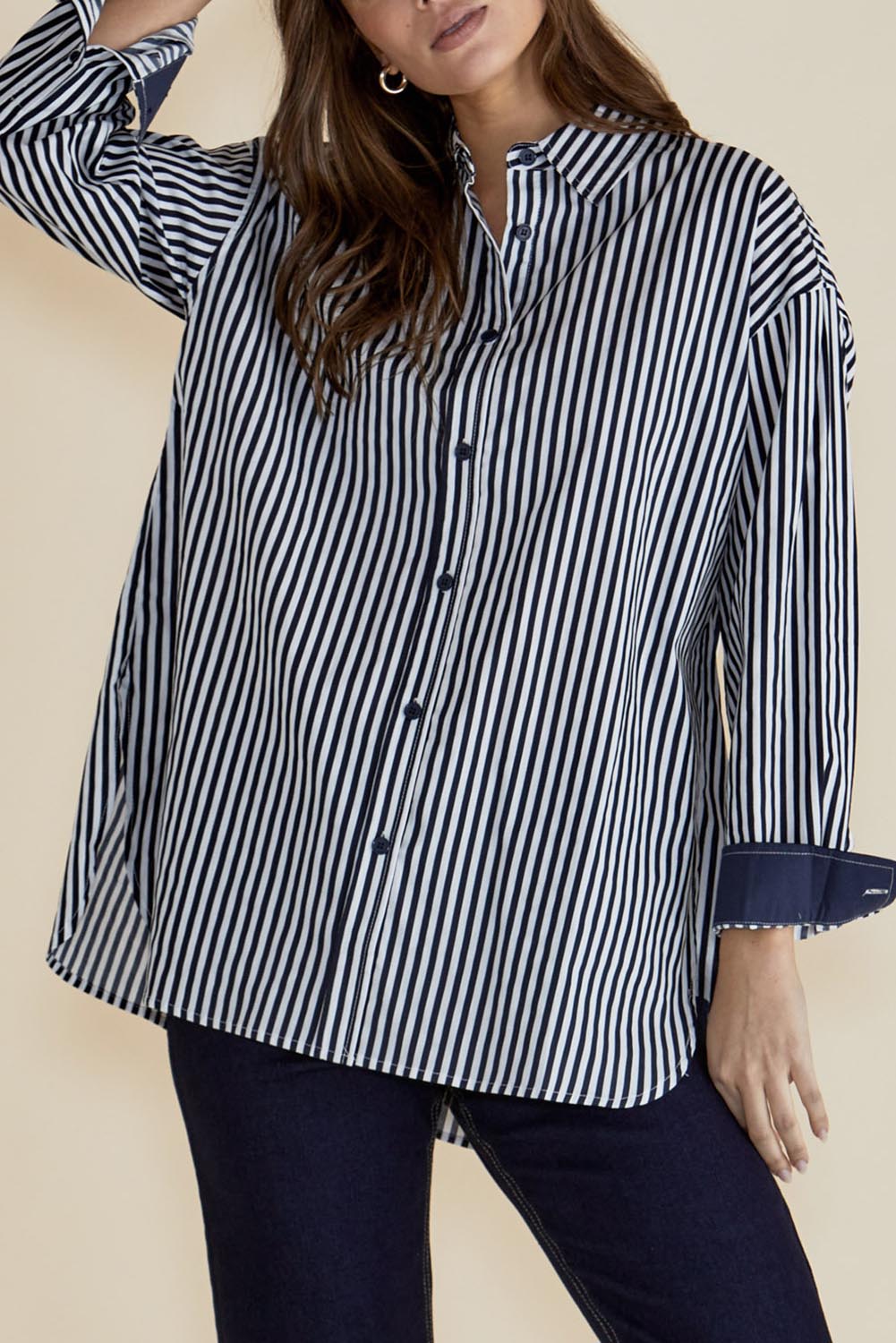 A model wearing the Claire Classic Cotton Shirt in colour Navystripe (Blue), from the front, cropped image