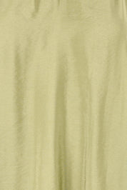 Product shot of the Vivienne Blouse in colour Pistachio (Green), detail