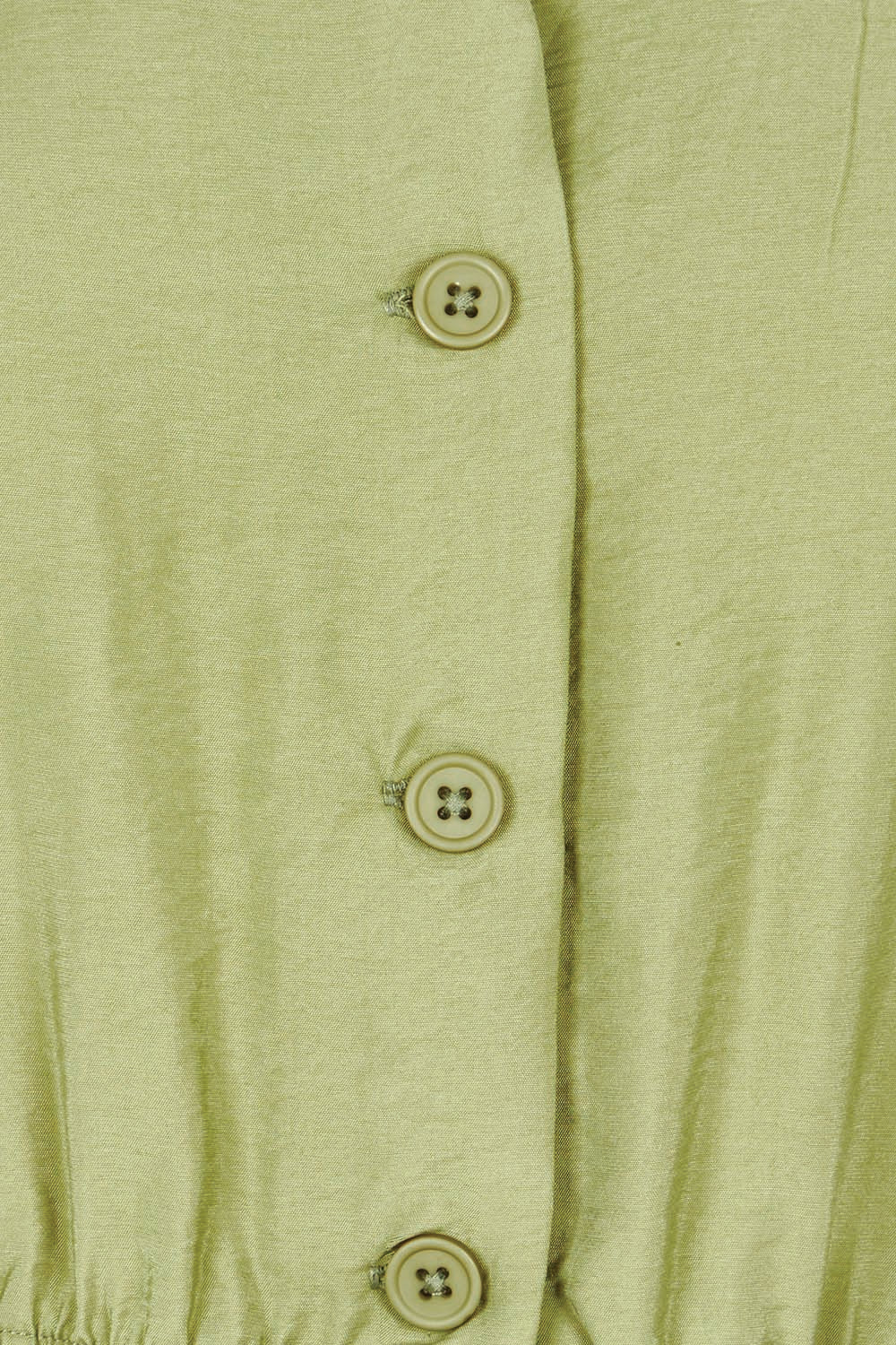 Product shot of the Elianna Dress in colour Pistachio (Green), detail
