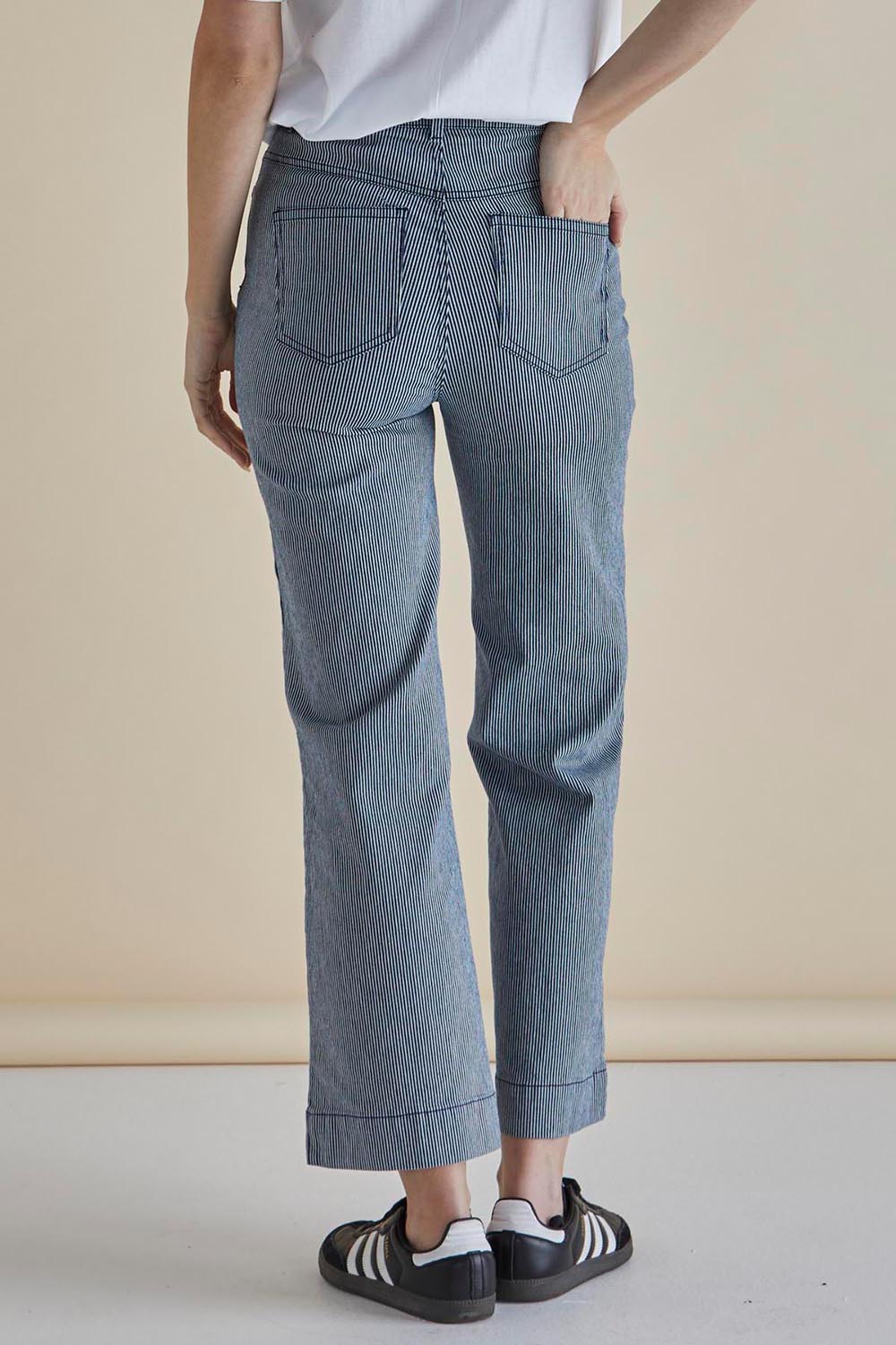 A model wearing the Willow Wide Leg Jean in colour Pinstripe (Blue), from the back