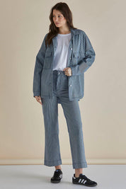 A model wearing the Willow Wide Leg Jean in colour Pinstripe (Blue), from the front, showing the whole outfit
