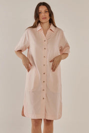 A model wearing the Dawson Denim Dress in colour Pink (Pink), from the front, cropped image
