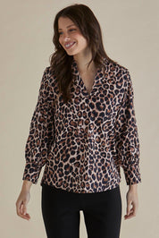A model wearing the Pinot Cotton Blouse in colour Leopard, from the front, cropped image