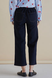 A model wearing the Easy Relax Jean in colour Bluesmoke (Blue), from the back