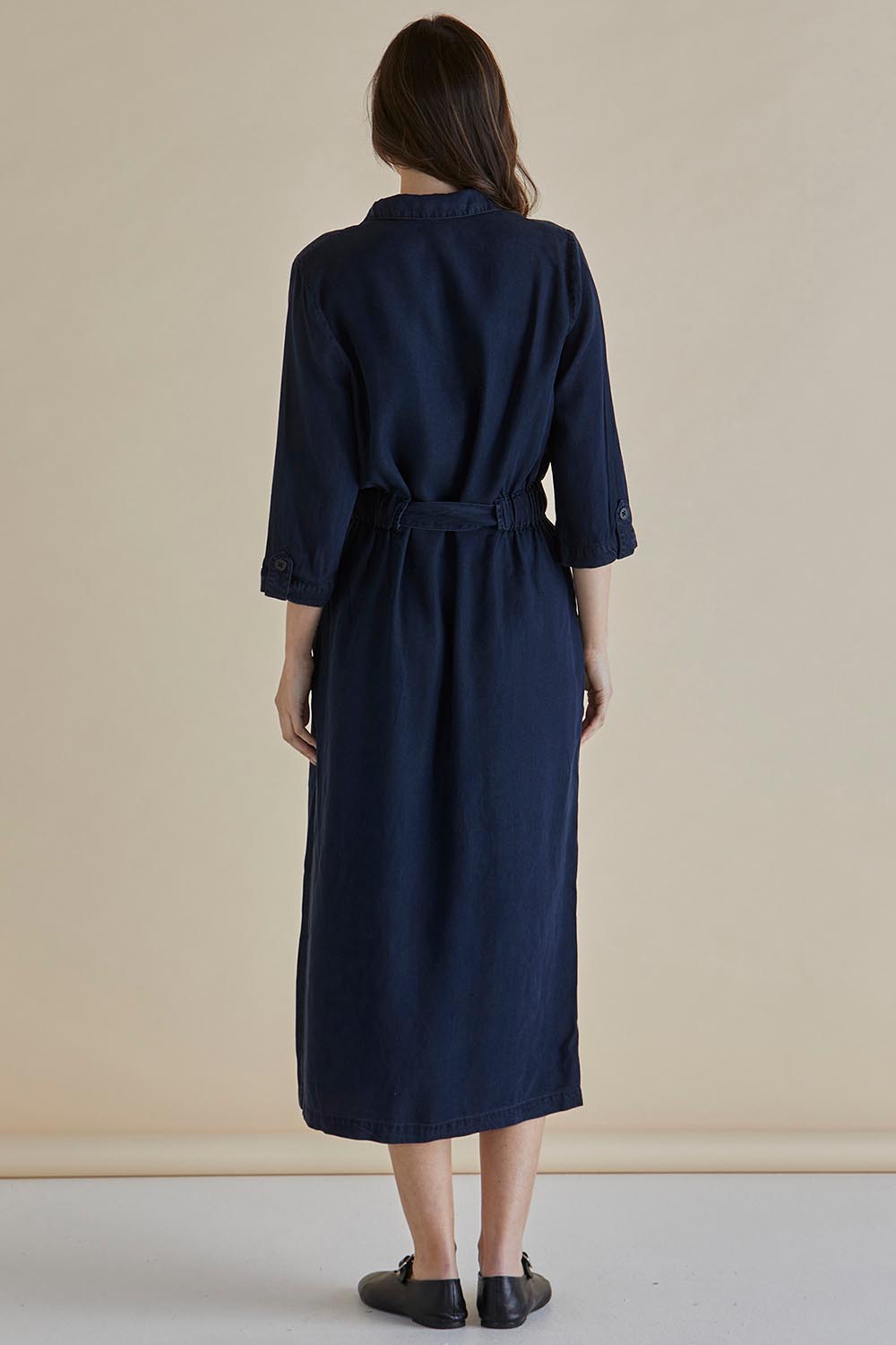 A model wearing the Betty Lyocell Shirt Dress in colour Bluevintag (Blue), from the back