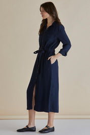 A model wearing the Betty Lyocell Shirt Dress in colour Bluevintag (Blue), from the front, showing the whole outfit