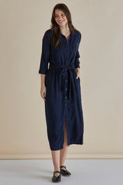 A model wearing the Betty Lyocell Shirt Dress in colour Bluevintag (Blue), from the front, showing the whole outfit